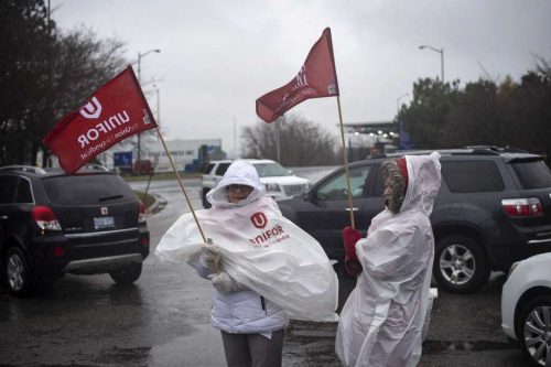 GM workers in Canada stage walkout as company prepares to shut down car ...