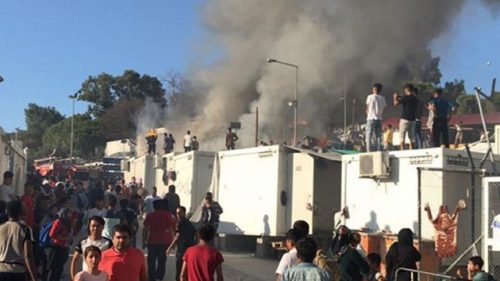 refugee camp fire Greece