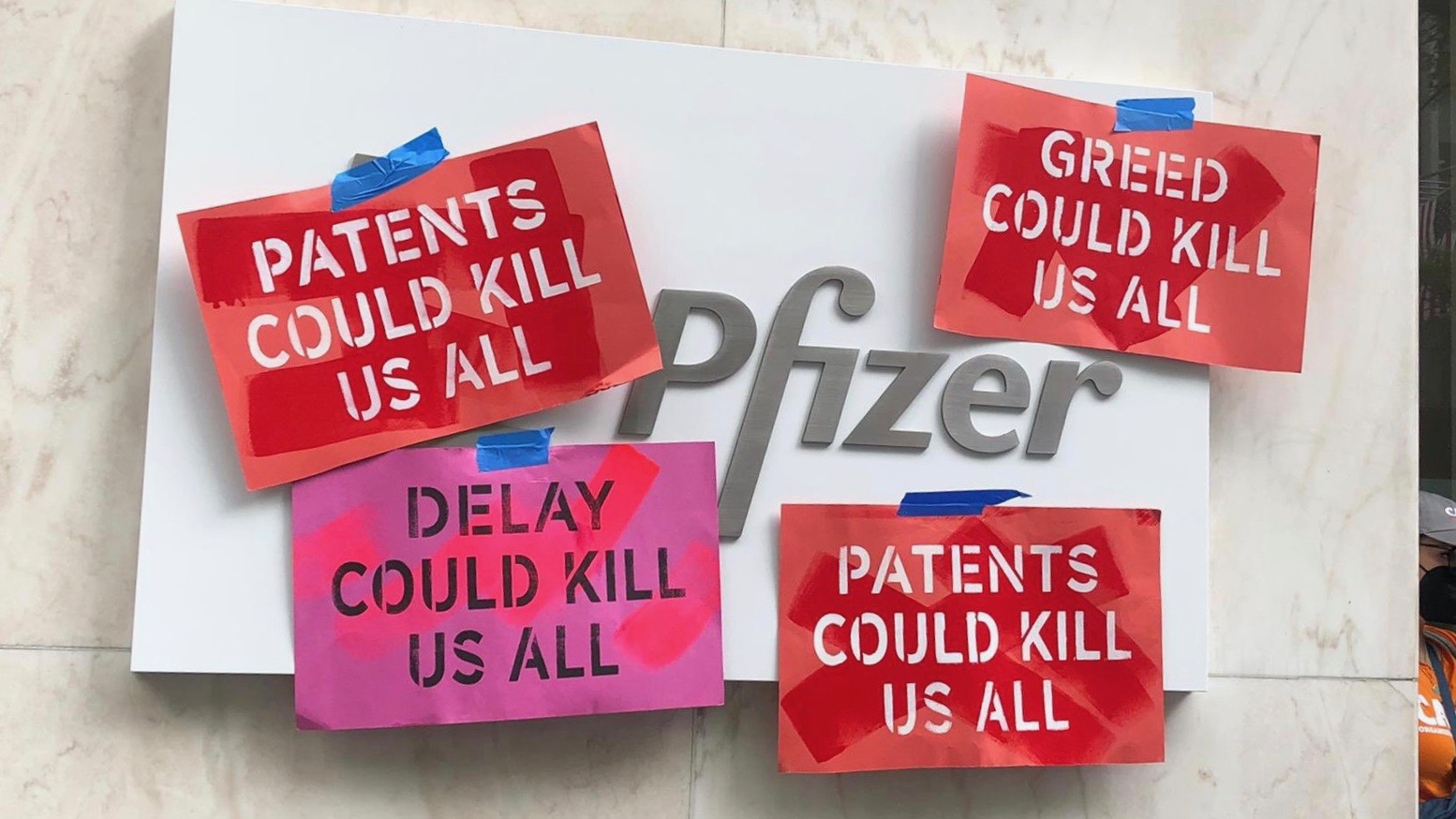 Pfizer Protest Free the vaccine: Protests greet German chancellor Angela Merkel on US ...