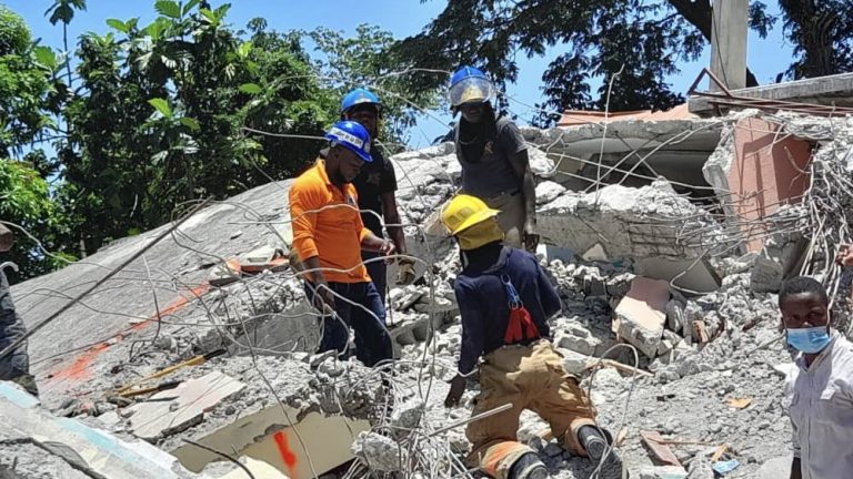 At least 1,297 people killed in Haiti following earthquake : Peoples ...