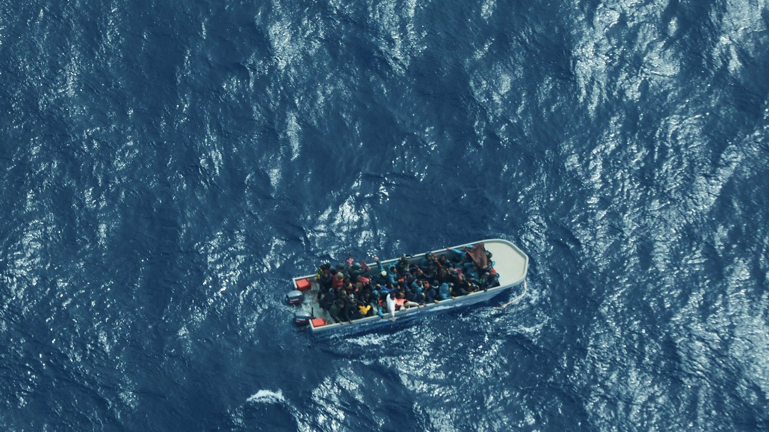 The boat carrying migrants that capsized off the Libyan coast.