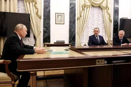 Russian President Vladimir Putin meets  Deputy Defense Minister Yunus-Bek Yevkurov and Andrei Troshev.
