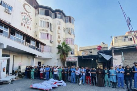 Staff of Al-Awda hospital honors their fallen colleagues.