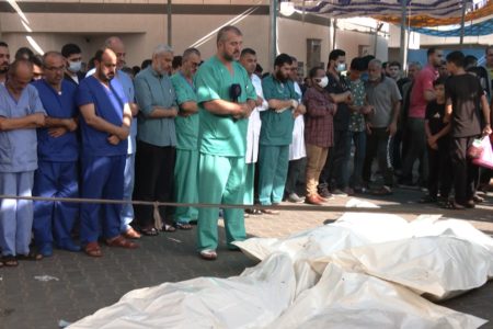 Medical Staff at Al-Shifa Complex conduct funeral prayers for doctors killed in Israeli offensive. The hospital was attacked again on Thursday, November 9. (Photo: Quds News Network)