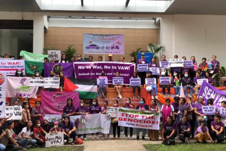 Filipina feminist groups rallied on November 25 to demand an end to violence against women and war.