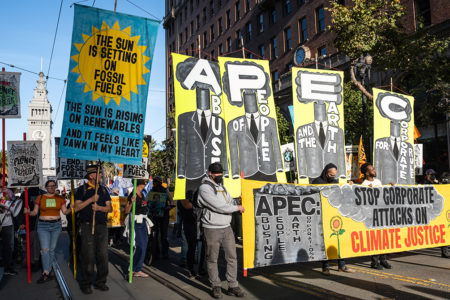 10,000 people march down the streets of San Francisco in opposition to the APEC Summit