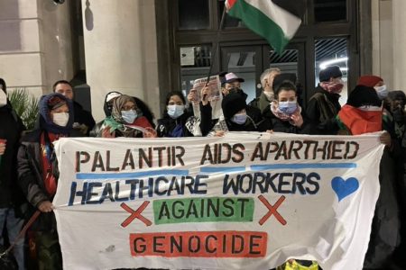 Health activists in the UK organize a mass picket line in front of the office of Palantir. Photo: PHM UK