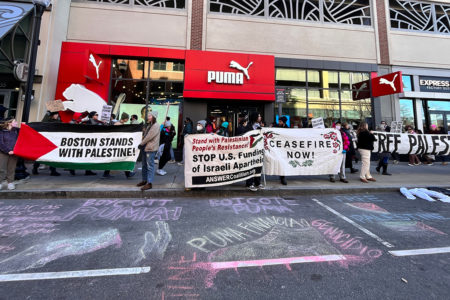 Picketers outside of a Puma store in Boston on Black Friday (Photo: Micah Fong)