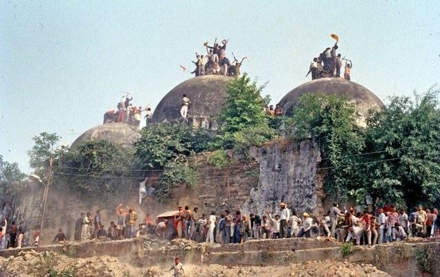 Hindu extremist mobs destroy the Babri Masjid in Ayodhya on December 6, 1992.
