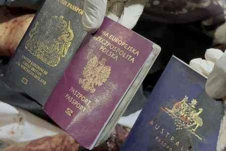 Passports of some of the slain foreign aid workers.