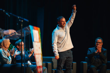 Foreign Minister of Venezuela Yvan Gil Pinto raises a fist in solidarity (Photo: Micah Fong)