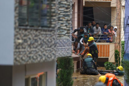 Rescuers evacuate flood victims in Lalitpur, Nepal ((Photo: Sulav Shrestha/Xinhua)
