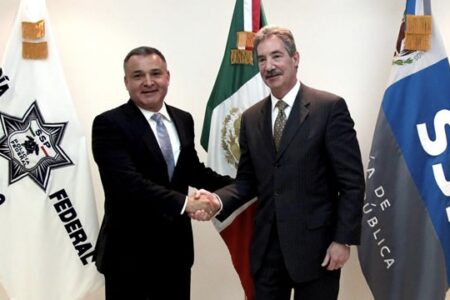 Former Mexican security chief Genaro García Luna with US Deputy Attorney General James Cole. Photo: Wikimedia Commons