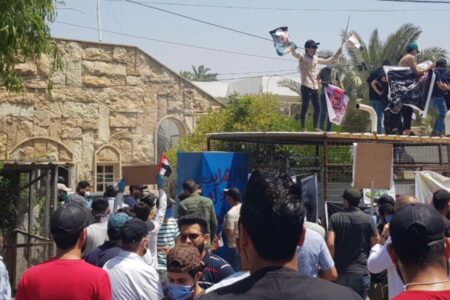 Protest in Baghdad in front of the MBC group headquarters. Photo via The Cradle