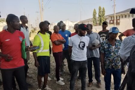 CPM-K members with port workers in Kenya. Photo: CPMK