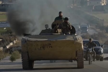 HTS militants entering Aleppo in December 2024. Photo: Wikimedia Commons