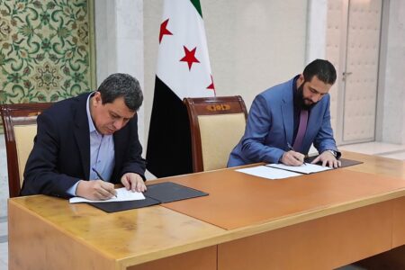 The signing of an agreement stipulating the integration of the Syrian Democratic Forces into the institutions of the Syrian Arab Republic. Photo: Ahmed al-Sharaa/X