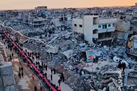 Palestinians break fast amidst the rubble in Gaza. Photo: Screenshot