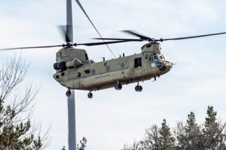 A CH-47F Chinook from the 1st Battalion, 214th Aviation Regiment, 12th Combat Aviation Brigade flies over the Grafenwoehr Training Area, Germany for aerial gunnery on March 3, 2025. Photo: US Army