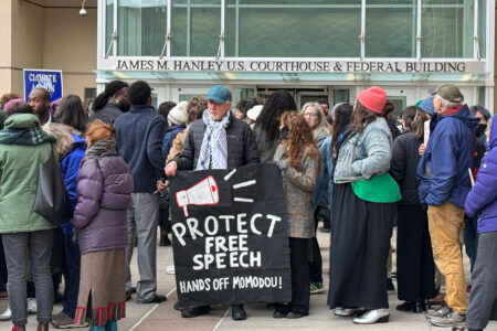 Crowd rallies outside hearing for student activist and graduate worker Momodou Taal's lawsuit against Trump in Syracuse, New York (Photo: Matt Dougherty)