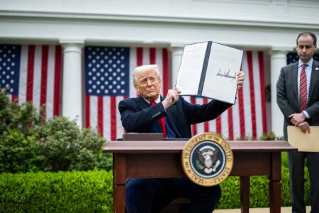Trump signs "retaliatory tariff" policy. (Photo: White House)