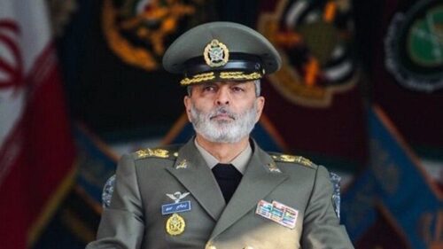 all revolutionary forces must unite behind this slogan: ‘Hands Off Iran!’