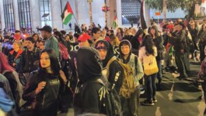 Protestors wave Palestine flags in Colombia