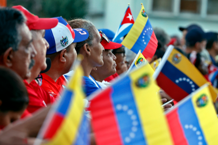 Thousands of Cubans march in support of Venezuela against US intervention People hold up Cuban and Venezuelan national flags during a rally in support of Venezuela, in Havana, Cuba, October 17, 2025.