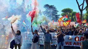 Protestors in Italy release smoke bombs