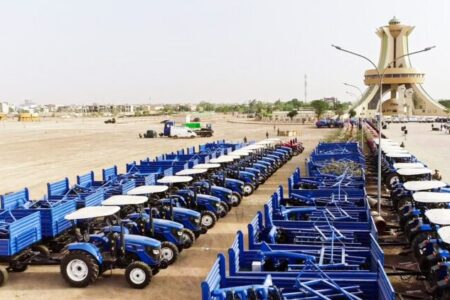Agricultural offensive- how Burkina Faso is moving towards self-sufficiency in food production Lines of blue tractors, part of the agricultural machinery being distributed to farmers by the government