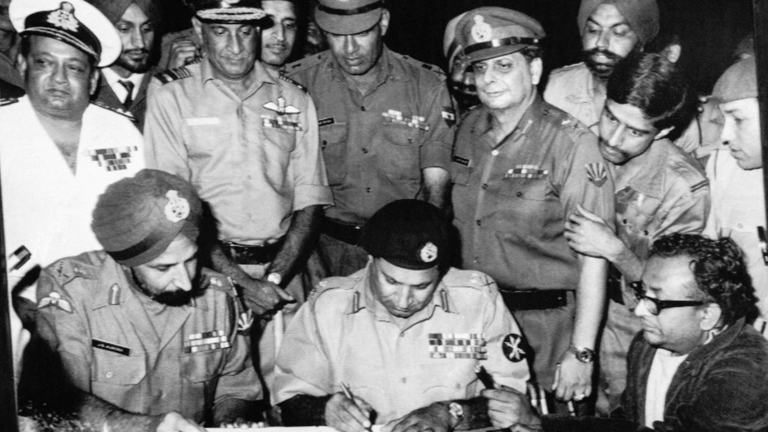 Signing of Pakistani Instrument of Surrender by Pakistan's Lt.Gen. A. A. K. Niazi to the Joint Commander of the Liberation Force Lt. Gen. Jagjit Singh Aurora in Dhaka on 16 Dec' 1971