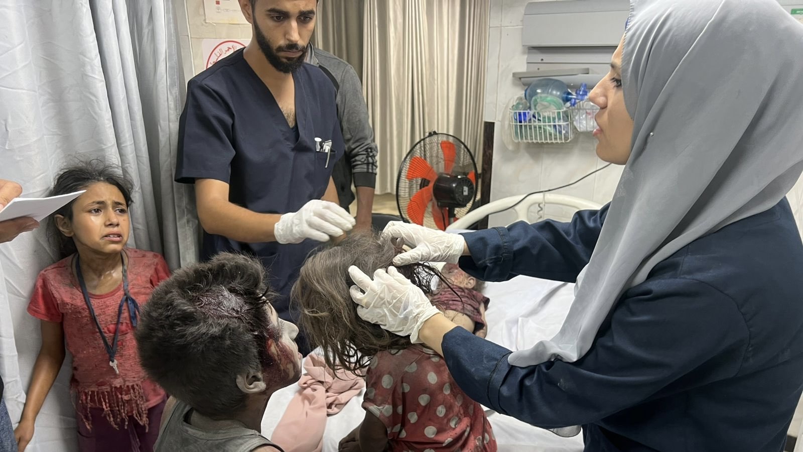 Children in the aftermath of an Israeli bombing in Gaza