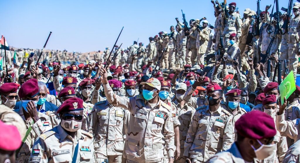 Members of the Rapid Support Forces with Mohamed Hamdan Dagalo