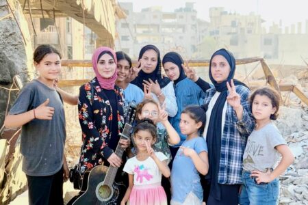 Palestinian music teacher Rola Dalloul with her students Palestinian music teacher Rola Dalloul with her students in Gaza