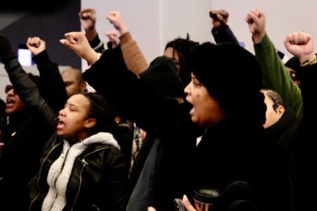 Raeisha Williams raised fists during press conference (1) Fists raised during press conference demanding the release of detained activists