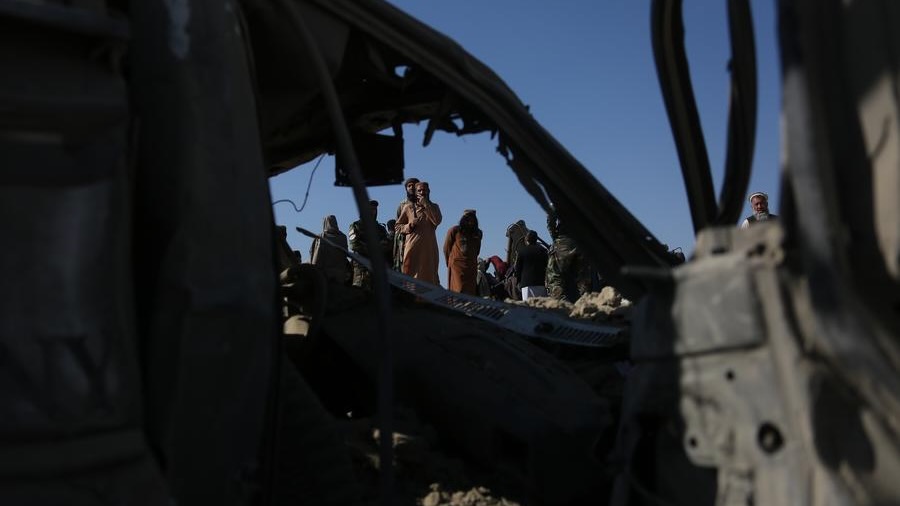 A damaged vehicle is pictured following an airstrike in Afghanistan's Nangarhar Province, on Feb. 22, 2026. (1)