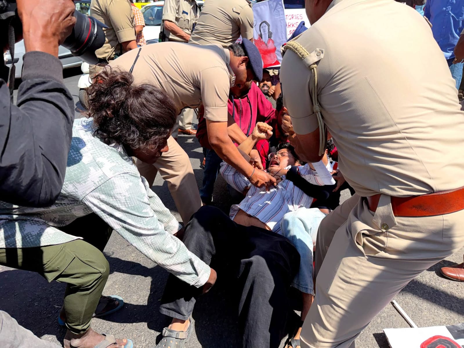 KITU General Secretary, Suhas Adiga, being forcefully arrested