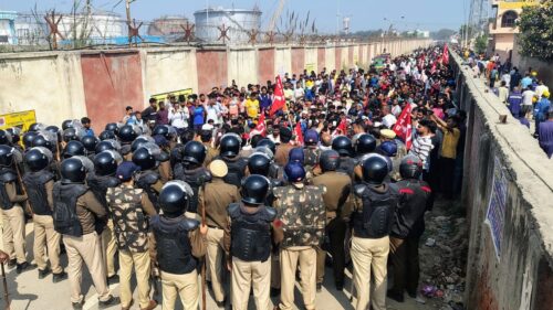 Sit-in demonstration during strike in india against 12 hour work day