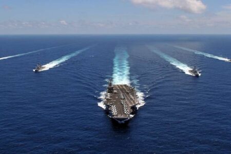 the-aircraft-carrier-uss-abraham-lincoln-cvn-72-leads-a-formation-of-ships-c85705-1024 The USS Abraham Lincoln, a nuclear-powered aircraft carrier, is one of several military assets the US has deployed to the Arabian Sea in recent days