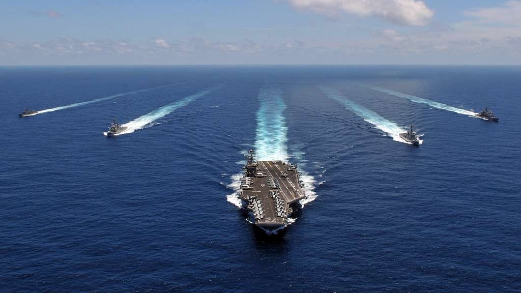 The USS Abraham Lincoln, a nuclear-powered aircraft carrier, is one of several military assets the US has deployed to the Arabian Sea in recent days