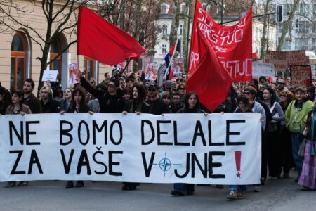 Janez Zalaznik 8M March 8 demonstration in Slovenia, carrying banner "We won't work for your wars." Source: Janez Zalaznik/Facebook