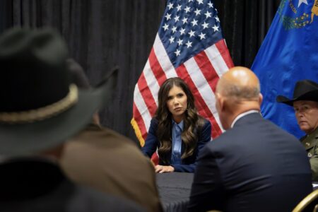 kristi noem with sheriffs 2 Kristi Noem