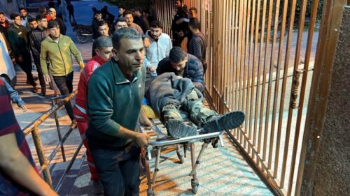Palestinians in Gaza carry martyrs of the latest Israeli airstrike on the strip