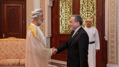 Iranian FM Abbas Araghchi shakes hand of Sultan of Oman Haitham bin Tariq