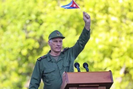 Miguel Diaz-Canel Miguel Diaz-Canel waves Cuban flag