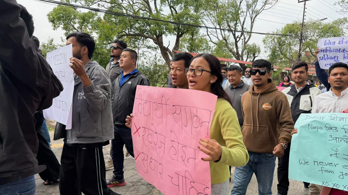 Nepali students march and raise posters against government ban on student groups