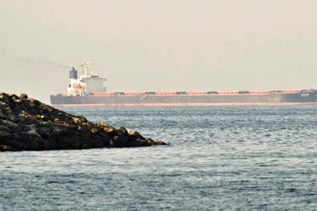 Strait of Hormuz A cargo ship is pictured off coast city of Fujairah, in the Strait of Hormuz in the northern Emirate on February 25, 2026