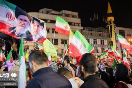 Tehran rallies showcase IRGC missiles Protestors in Tehran wave Iranian flags
