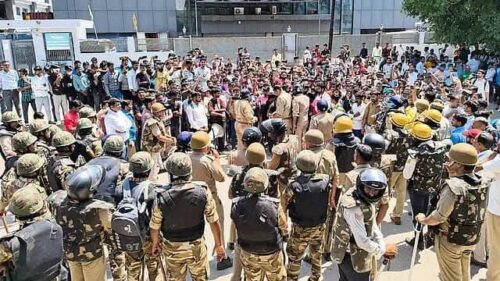 workers protest in Noida, Uttar Pradesh