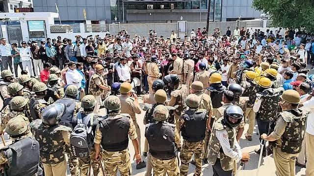 workers protest in Noida, Uttar Pradesh